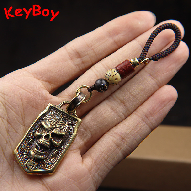 Vintage Fashion Tags - จี้ห้อยรูปหัวกะโหลกสไตล์วินเทจสำหรับพวงกุญแจ พังก์ร็อก ฮิปฮอป เครื่องประดับผู้ชายสุดเทรนดี้ ทำจากทองเหลืองแท้ ดีไซน์เท่ห์